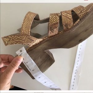 Gold platform shoes